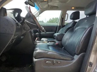 2014 Infiniti QX80 with VIN JN8AZ2NE1E9067594, listed as a Copart auction lot 60652435 with 109,062 mi miles and Salvage title. Bid and sale history available at DreamBid. Image 7.