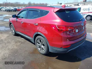 2014 Hyundai Santa Fe z VIN 5XYZUDLB3EG226857, wystawiony jako IAAI lot #41917762 z przebiegiem 42 677 mil mil oraz . Historia ofert i sprzedaży dostępna na DreamBid. Obrazek 3.