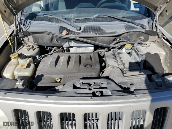 2010 Jeep Patriot Sport with VIN 1J4NT2GB8AD531645, listed as a Copart auction lot 50044475 with 154,500 mi miles and Salvage Title. Bid and sale history available at carsss.com. Image 12.
