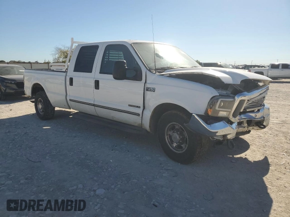 2000 Ford F-350 XL with VIN 3FTSW30F7YMA72223, listed as a Copart auction lot 81574774 with 203,727 mi miles and Salvage Title. Bid and sale history available at DreamBid. Image 4.