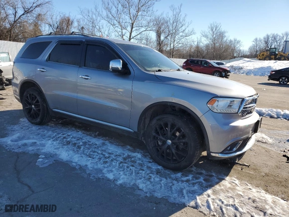 2015 Dodge Durango Citadel with VIN 1C4RDJEG7FC799354, listed as a Copart auction lot 87958385 with 217,849 mi miles and Salvage Title. Bid and sale history available at carsss.com. Image 4.