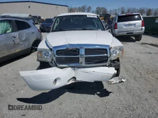 2007 Dodge Dakota SLT z VIN 1D7HE48P77S164721, wystawiony jako Copart lot #49673685 z przebiegiem 218 861 mil mil oraz Szkody całkowita. Historia ofert i sprzedaży dostępna na DreamBid. Obrazek 5.