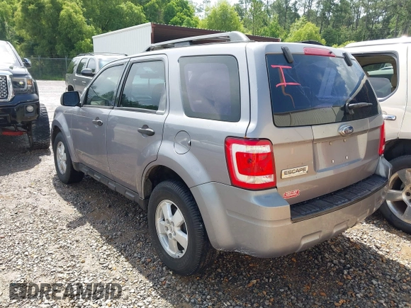 2008 Ford Escape XLS with VIN 1FMCU02Z18KD21828, listed as a IAAI auction lot 42506293 with 254,958 mi miles and . Bid and sale history available at DreamBid. Image 3.