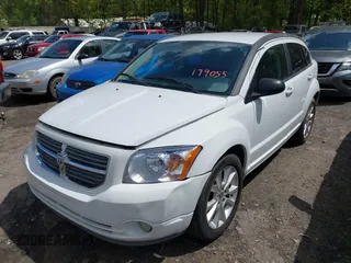 2011 Dodge Caliber Heat with VIN 1B3CB5HA9BD179055, listed as a IAAI auction lot 42008150 with 245,700 mi miles and . Bid and sale history available at DreamBid. Image 2.