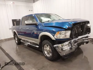 2011 Ram 2500 SLT z VIN 3D7TT2CT6BG608731, wystawiony jako IAAI lot #41589413 z przebiegiem 243 826 mil mil oraz . Historia ofert i sprzedaży dostępna na DreamBid. Obrazek 1.