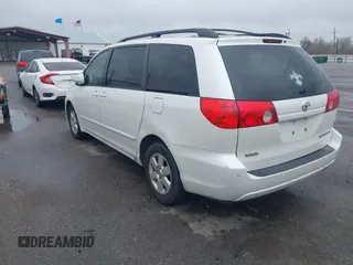 2010 Toyota Sienna XLE with VIN 5TDYK4CC1AS330349, listed as a IAAI auction lot 41607065 with 258,145 mi miles and . Bid and sale history available at carsss.com. Image 3.