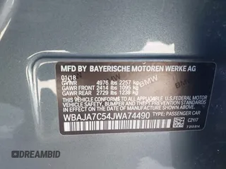 2018 BMW 5 Series 530i xDrive with VIN WBAJA7C54JWA74490, listed as a IAAI auction lot 41986285 with 68,768 mi miles and . Bid and sale history available at DreamBid. Image 9.