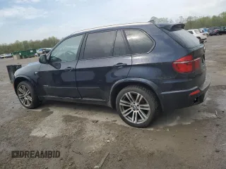 2012 BMW X5 35i z VIN 5UXZV4C5XCL748652, wystawiony jako Copart lot #55457455 z przebiegiem 149 030 mil mil oraz Szkoda całkowita • Salvage title. Historia ofert i sprzedaży dostępna na DreamBid. Obrazek 2.