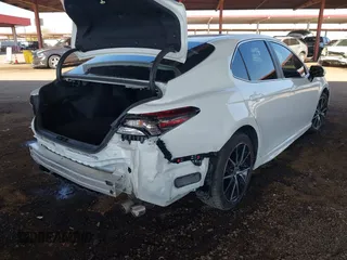 2021 Toyota Camry SE Nightshade with VIN 4T1G11AK4MU413986, listed as a IAAI auction lot 41472262 with 83,247 mi miles and . Bid and sale history available at DreamBid. Image 4.