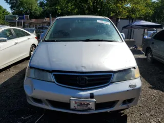 2003 Honda Odyssey EX-L z VIN 5FNRL18903B007639, wystawiony jako Copart lot #57230975 z przebiegiem 189 235 mil mil oraz Szkoda całkowita • Salvage title. Historia ofert i sprzedaży dostępna na DreamBid. Obrazek 5.