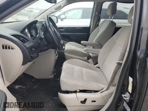 2017 Dodge Grand Caravan SE with VIN 2C4RDGBG3HR741842, listed as a Copart auction lot 49535695 with 211,169 mi miles and Clean Title. Bid and sale history available at DreamBid. Image 7.
