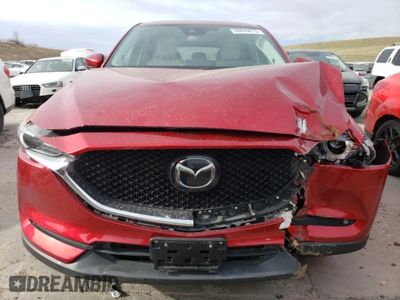 2021 Mazda CX-5 Grand Touring Reserve with VIN JM3KFBAY4M0358478, listed as a Copart auction lot 50839815 with 84,932 mi miles and Salvage Title. Bid and sale history available at DreamBid. Image 5.