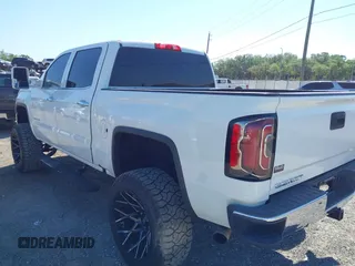 2017 GMC Sierra 1500 SLT z VIN 3GTU2NEC2HG474079, wystawiony jako IAAI lot #41899673 z przebiegiem 104 033 mil mil oraz . Historia ofert i sprzedaży dostępna na DreamBid. Obrazek 3.