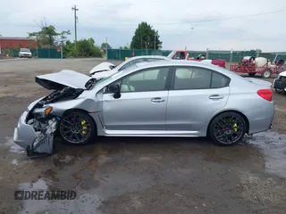 2019 Subaru WRX STI Limited с VIN JF1VA2V63K9807256, выставлен на аукционе IAAI как лот 42390008 с пробегом 74 821 миль миль и . История ставок и продаж доступна на DreamBid. Изображение 14.