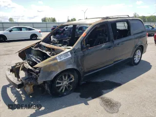 2014 Dodge Grand Caravan SXT z VIN 2C4RDGCG4ER230764, wystawiony jako Copart lot #52713905 z przebiegiem Nie podano mil oraz Szkody całkowita. Historia ofert i sprzedaży dostępna na DreamBid. Obrazek 1.