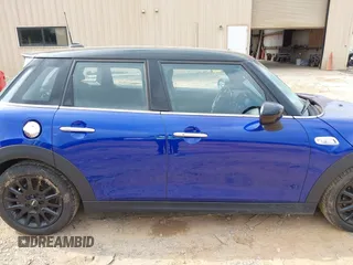 2021 MINI Hardtop 4 Door Cooper S with VIN WMWXU9C00M2N60370, listed as a IAAI auction lot 42426257 with 11,288 mi miles and . Bid and sale history available at DreamBid. Image 13.