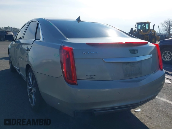 2013 Cadillac XTS Luxury z VIN 2G61R5S31D9185009, wystawiony jako IAAI lot #41243001 z przebiegiem 161 219 mil mil oraz . Historia ofert i sprzedaży dostępna na DreamBid. Obrazek 3.