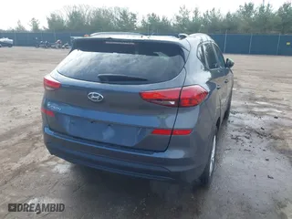 2019 Hyundai Tucson Value with VIN KM8J33A40KU999340, listed as a IAAI auction lot 41876380 with 52,752 mi miles. Bid and sale history available at carsss.com. Image 4.