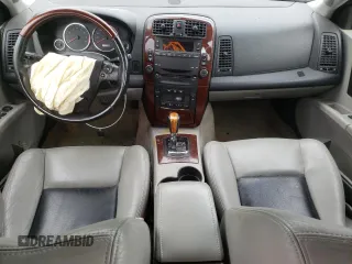 2006 Cadillac CTS with VIN 1G6DP577960116712, listed as a Copart auction lot 73001114 with 103,793 mi miles and Salvage Title. Bid and sale history available at carsss.com. Image 8.