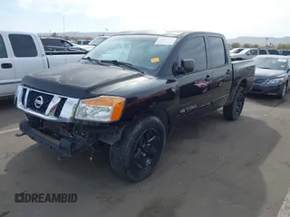 2012 Nissan Titan SL with VIN 1N6AA0EC0CN314014, listed as a IAAI auction lot 41562597 with 152,678 mi miles and . Bid and sale history available at DreamBid. Image 2.