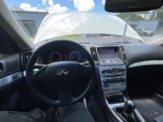 2014 Infiniti Q60 Journey с VIN JN1CV6EKXEM110777, выставлен на аукционе Copart как лот 60266245 с пробегом 128 272 миль миль и Чистый • Clean title. История ставок и продаж доступна на DreamBid. Изображение 9.