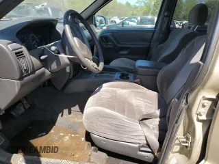 2001 Jeep Grand Cherokee Laredo с VIN 1J4GX48S11C536456, выставлен на аукционе Copart как лот 52292015 с пробегом 201 672 миль миль и Списание • Salvage title. История ставок и продаж доступна на DreamBid. Изображение 7.