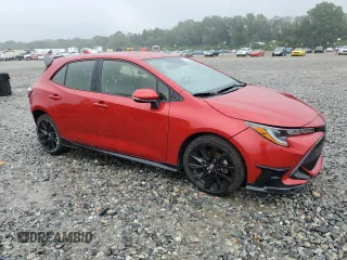2021 Toyota Corolla Hatchback SE with VIN JTND4MBEXM3106543, listed as a Copart auction lot 70139804 with 69,709 mi miles and Salvage Title. Bid and sale history available at carsss.com. Image 4.