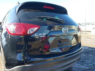 2016 Mazda CX-5 Sport with VIN JM3KE4BY0G0662294, listed as a IAAI auction lot 41469721 with 127,116 mi miles and . Bid and sale history available at carsss.com. Image 17.