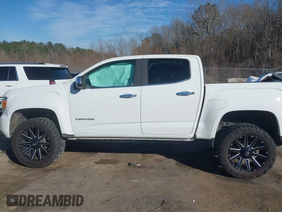 2019 GMC Canyon 4WD SLT with VIN 1GTG6DEN8K1109070, listed as a IAAI auction lot 41394345 with 67,357 mi miles. Bid and sale history available at carsss.com. Image 15.