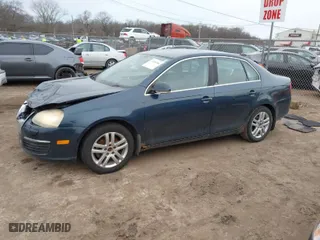 2006 Volkswagen Jetta Sedan 1.9L TDI with VIN 3VWST71K56M032034, listed as a IAAI auction lot 41498486 with 137,573 mi miles. Bid and sale history available at carsss.com. Image 14.