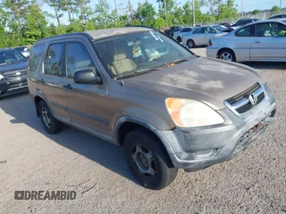 2003 Honda CR-V LX z VIN SHSRD68423U107703, wystawiony jako IAAI lot #42128688 z przebiegiem 170 239 mil mil oraz . Historia ofert i sprzedaży dostępna na DreamBid. Obrazek 1.