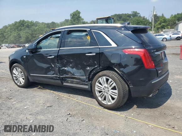 2019 Cadillac XT5 Premium Luxury AWD with VIN 1GYKNFRS9KZ223065, listed as a Copart auction lot 60902645 with 101,168 mi miles and Salvage title. Bid and sale history available at DreamBid. Image 2.