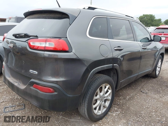 2015 Jeep Cherokee Latitude with VIN 1C4PJLCB6FW547788, listed as a IAAI auction lot 42177621 with 138,945 mi miles and . Bid and sale history available at carsss.com. Image 4.