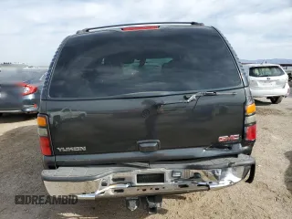 2005 GMC Yukon SLT z VIN 1GKEC13T25R129504, wystawiony jako Copart lot #50785955 z przebiegiem Nie podano mil oraz Szkoda całkowita • Salvage title. Historia ofert i sprzedaży dostępna na DreamBid. Obrazek 6.