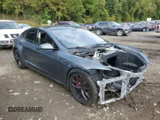 2014 Tesla Model S 60 with VIN 5YJSA1H14EFP28471, listed as a Copart auction lot 73715834 with 99,442 mi miles and Clean Title. Bid and sale history available at DreamBid. Image 4.