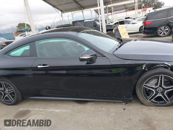 2020 Mercedes-Benz C 300 with VIN W1KWJ8DB7LF985843, listed as a IAAI auction lot 41484590 with 22,561 mi miles and . Bid and sale history available at DreamBid. Image 14.