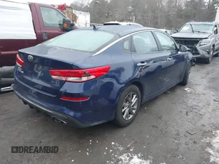 2019 Kia Optima LX with VIN 5XXGT4L37KG312708, listed as a IAAI auction lot 41518703 with 84,983 mi miles. Bid and sale history available at carsss.com. Image 4.