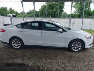 2016 Ford Fusion S with VIN 3FA6P0G74GR221383, listed as a IAAI auction lot 42442456 with 109,144 mi miles and . Bid and sale history available at DreamBid. Image 13.