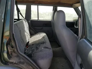 1997 Jeep Cherokee SE with VIN 1J4FT28SXVL540135, listed as a Copart auction lot 77043714 with 0 mi miles and Clean Title. Bid and sale history available at carsss.com. Image 11.