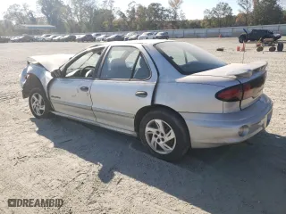 2001 Pontiac Sunfire SE with VIN 1G2JB524817417326, listed as a Copart auction lot 78038904 with 128,860 mi miles and Salvage Title. Bid and sale history available at carsss.com. Image 2.