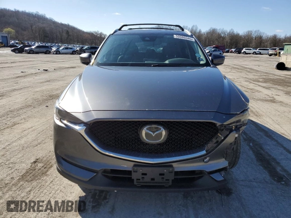 2018 Mazda CX-5 Grand Touring with VIN JM3KFBDM2J0407164, listed as a Copart auction lot 50080345 with 126,464 mi miles and Salvage title. Bid and sale history available at DreamBid. Image 5.
