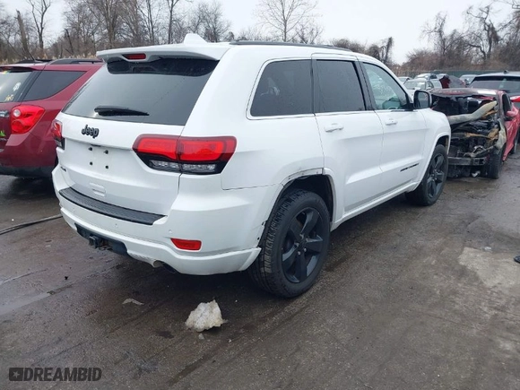 2015 Jeep Grand Cherokee Altitude with VIN 1C4RJFAG7FC954853, listed as a IAAI auction lot 40988796 with 107,002 mi miles. Bid and sale history available at carsss.com. Image 4.
