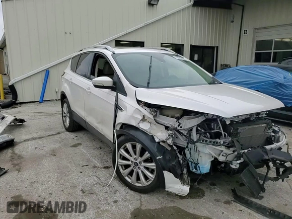 2017 Ford Escape Titanium with VIN 1FMCU0JD1HUE66040, listed as a Copart auction lot 43942665 with 55,484 mi miles and Salvage Title. Bid and sale history available at DreamBid. Image 12.