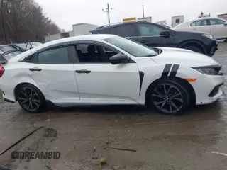 2019 Honda Civic Sport with VIN 2HGFC2F80KH605100, listed as a IAAI auction lot 41825640 with 82,363 mi miles and . Bid and sale history available at DreamBid. Image 13.