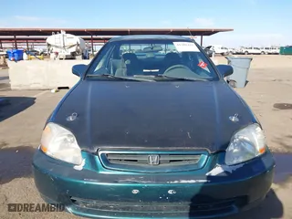1998 Honda Civic EX with VIN 1HGEJ8240WL013387, listed as a IAAI auction lot 41302427 with 255,039 mi miles. Bid and sale history available at carsss.com. Image 12.