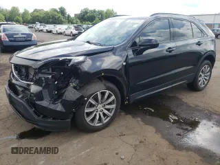 2019 Cadillac XT4 AWD Sport с VIN 1GYFZFR46KF199557, выставлен на аукционе Copart как лот 62404775 с пробегом 67 715 миль миль и Списание • Salvage title. История ставок и продаж доступна на DreamBid. Изображение 1.