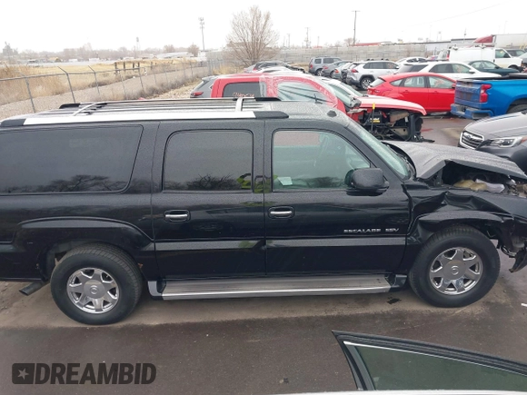 2005 Cadillac Escalade ESV z VIN 3GYFK66N55G236991, wystawiony jako IAAI lot #41506682 z przebiegiem 230 439 mil mil oraz . Historia ofert i sprzedaży dostępna na DreamBid. Obrazek 13.
