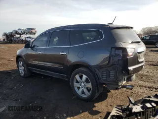 2016 Chevrolet Traverse LTZ with VIN 1GNKVJKD7GJ113276, listed as a Copart auction lot 47644235 with 104,626 mi miles and Salvage Title. Bid and sale history available at DreamBid. Image 2.