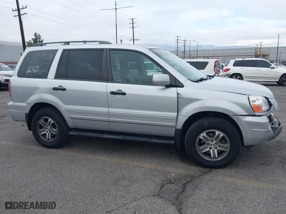 2004 Honda Pilot EX with VIN 2HKYF18644H596075, listed as a IAAI auction lot 41093500 with 92,952 mi miles. Bid and sale history available at carsss.com. Image 13.