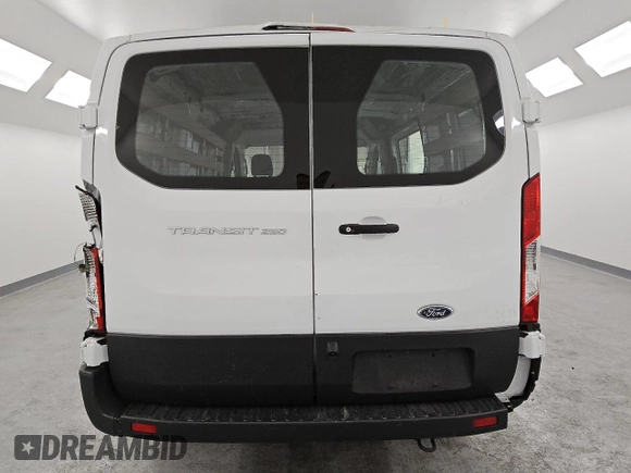 2023 Ford Transit Cargo with VIN 1FTBR1Y86PKB40356, listed as a Copart auction lot 45669345 with 12,890 mi miles and Salvage Title. Bid and sale history available at DreamBid. Image 6.